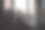 一个患癌症的年轻女人坐在窗前闻着花香。图片下载