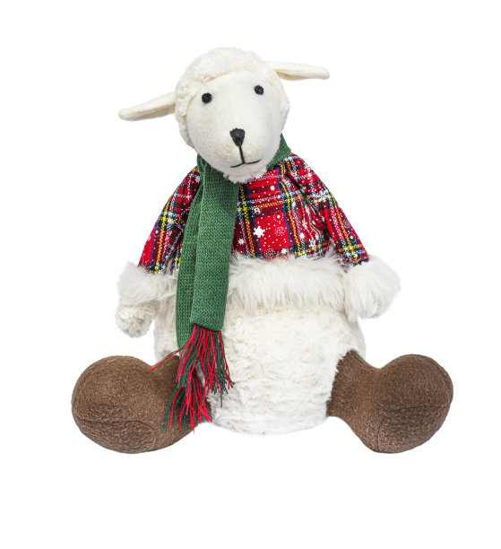 白色背景上的玩具羔羊。美丽可爱的圣诞羔羊孤立。图片下载