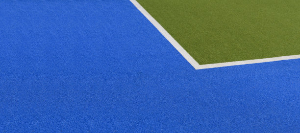 运动场横幅背景。体育场内的彩色人造草皮球场图片下载