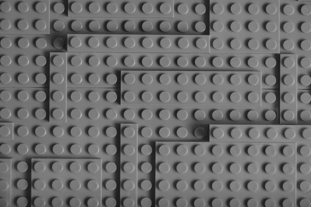 抽象浮雕背景，纹理灰色的儿童砖图片下载