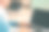 注意力不集中的年长女性坐在白色办公桌前使用笔记本电脑。成熟的白人女士在商务工作中用键盘打字图片下载