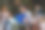 男生坐在校园里使用笔记本电脑的照片。图片下载
