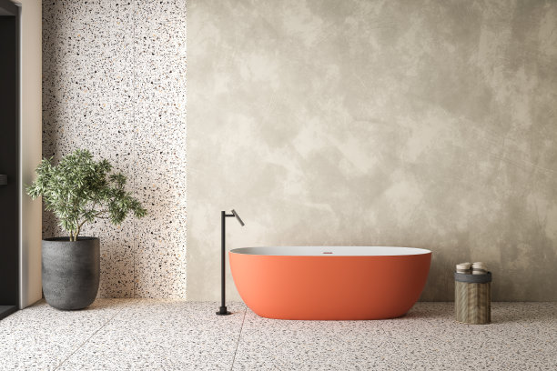 现代浴室以橙色和白色的浴缸、水磨石地板和墙壁、混凝土墙、篮子、植物、吊灯、隐藏的照明和自然光为特色。三维渲染图片下载