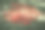 红色的棒棒糖与绿色的草地相映成色，户外的大地艺术品体现了环保理念图片下载