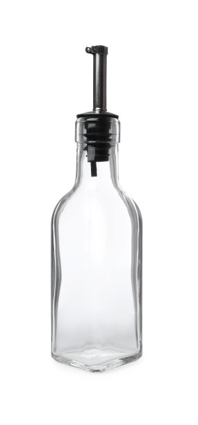 白色背景上装有油泵的空玻璃瓶图片下载