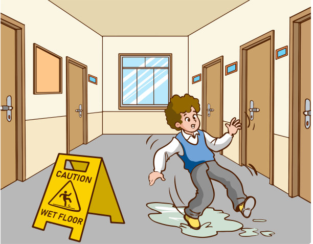 男孩在湿地板上滑倒了图片下载
