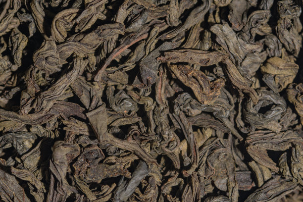 暗背景壁纸与茶叶宏图片下载