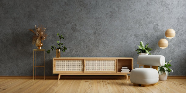 客厅内有混凝土墙的电视墙柜和扶手椅。图片下载