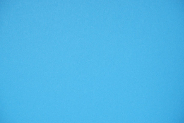 纸、纸板背景。高分辨率的纸张纹理。蓝色背景。图片下载