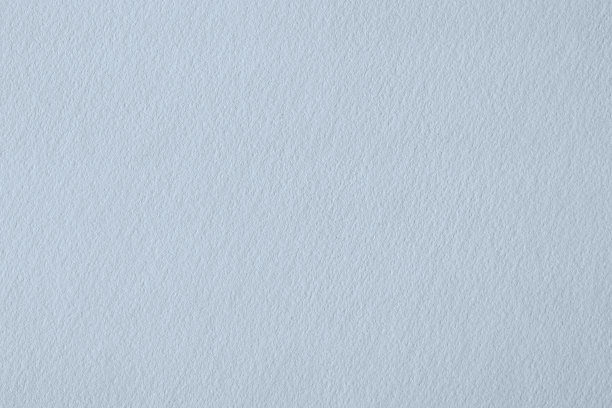 浅蓝色纹理的水彩纸作为背景。水彩颜料空白页图片下载