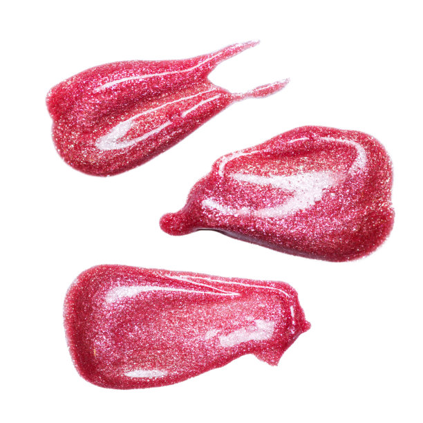 套不同的唇彩涂抹孤立的白色。弄脏的彩妆产品样品。图片下载