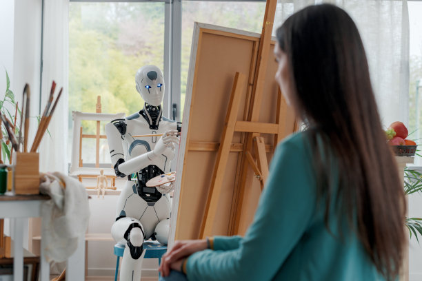 人工智能机器人在艺术工作室画肖像图片下载