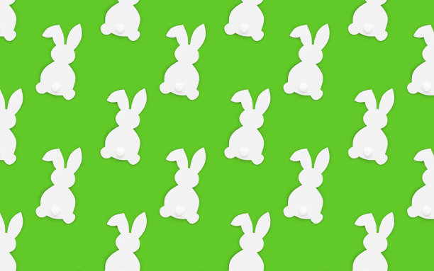 绿色背景上的白兔剪影，按照复活节主题的模板排列图片下载