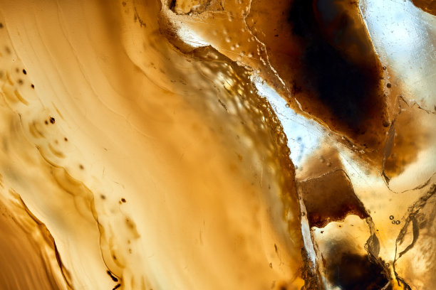 黄色首饰材质的特写镜头，色彩艳丽，美观大方。图片下载