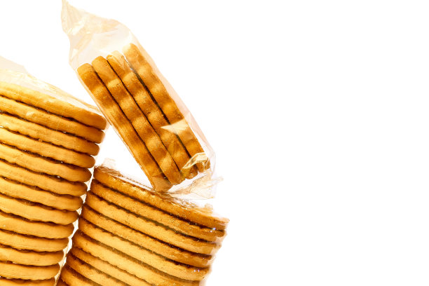 美味的甜饼干在一个保护性玻璃纸包装上出售图片下载