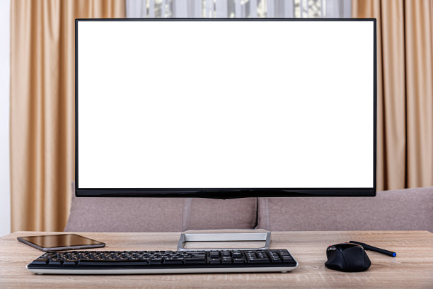 木桌上的台式电脑。图片下载