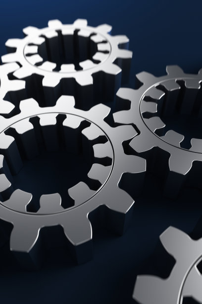 金属齿轮在蓝色背景上的特写。3d渲染图。图片下载