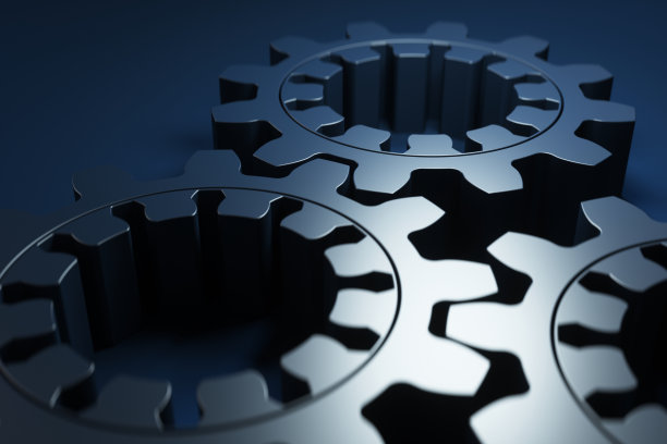 金属齿轮在蓝色背景上的特写。3d渲染图。图片下载