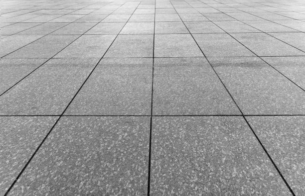 旧鹅卵石路面的抽象背景。图片下载