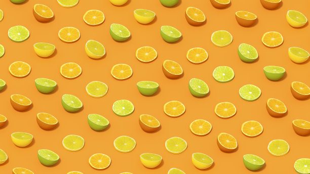 柠檬和橙子水果片与阳光在橙色背景图片下载