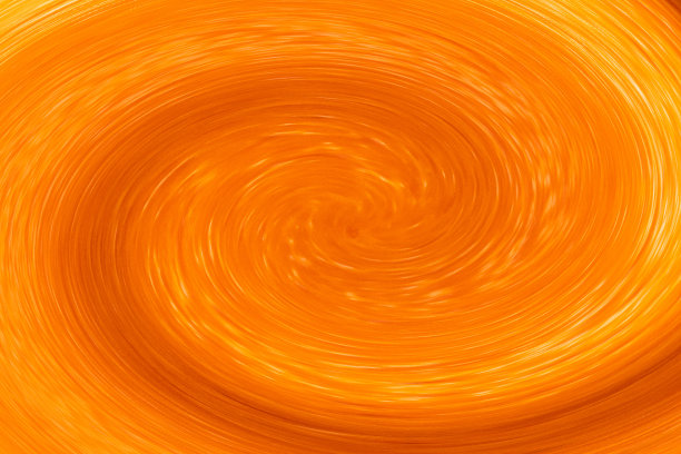 螺旋明亮的橙色抽象背景。动态彩色漩涡形状图案图片下载
