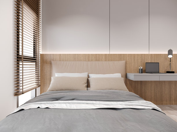 舒适的卧室内部，床和笔记本电脑在桌子上，3d渲染图片下载