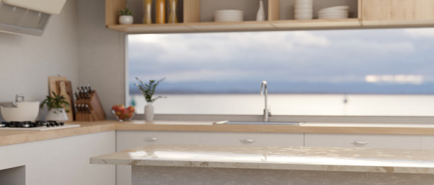 在现代厨房的大理石厨房岛上复制空间图片下载