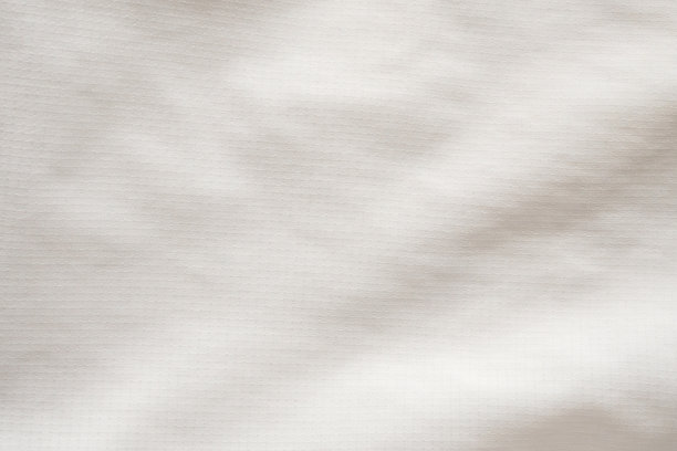 白色运动服装面料足球衫球衣纹理抽象的背景图片下载