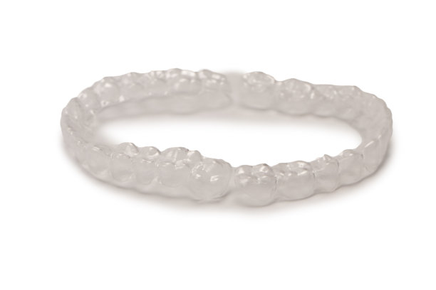 透明的口腔护套上隔离一层白色。图片下载