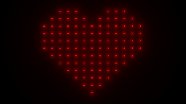 心形图案由黑色背景上亮着的红色灯泡组成。3 d渲染。图片下载