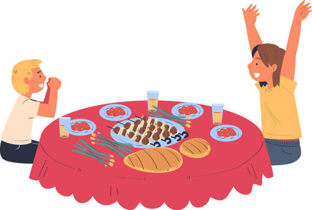 快乐的孩子们围坐在餐桌上吃着节日大餐图片下载