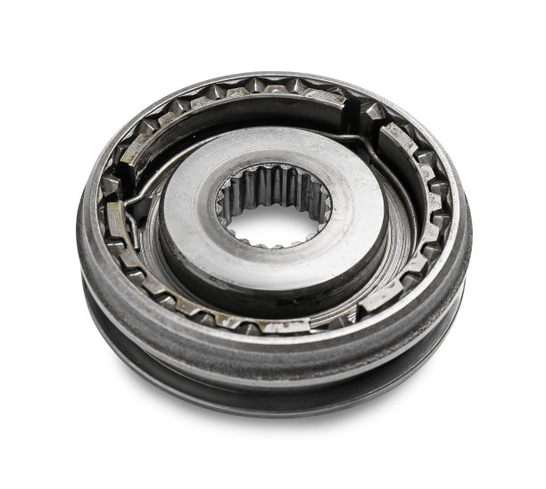 新的不锈钢齿轮在白色的背景图片下载