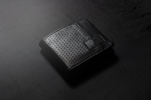 黑色皮革钱包暗背景低调的照片图片下载