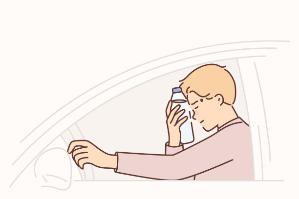 坐在方向盘后面的男司机把水瓶放在额头上感到头痛，闭上眼睛图片下载