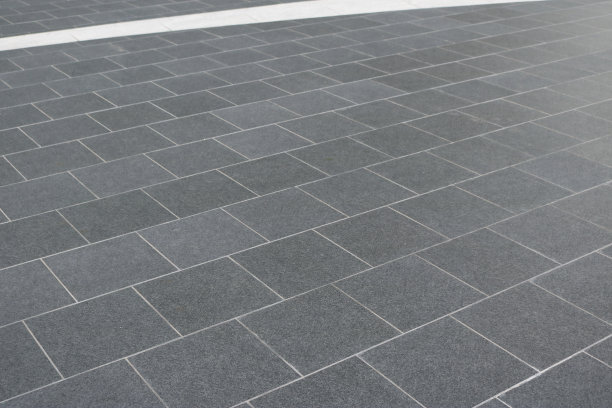 深灰色瓷砖地板图案背景。图片下载