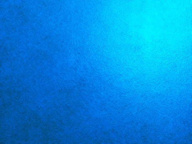 背景图像显示了混凝土墙上蓝色的美丽渐变反射。图片下载