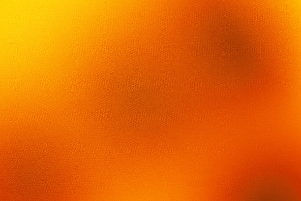 黄橙红火红金棕色黑色抽象背景。颜色渐变。粗糙，颗粒，噪音。图片下载