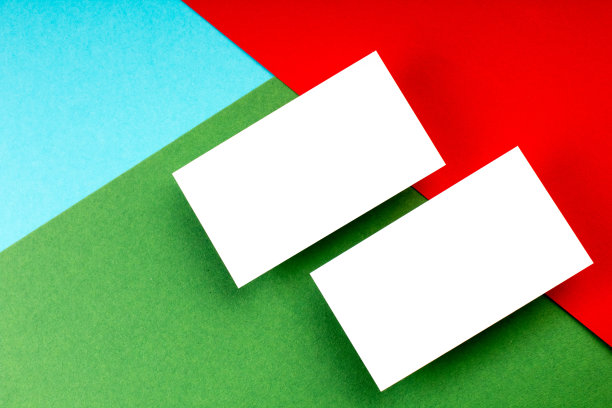 名片空白的彩色背景。文本的复制空间。前视图。名片空白在彩色抽象背景。企业文具品牌模型。文本的复制空间。前视图。图片下载