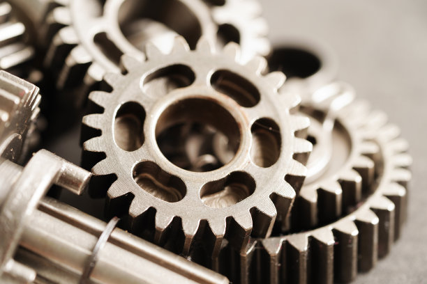金属齿轮发动机汽车和自行车，机械工业的概念。图片下载