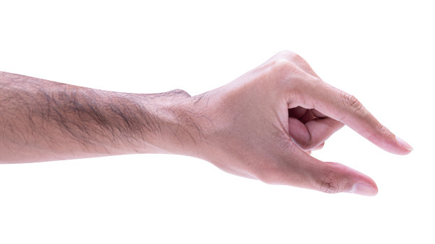 一个男人的手在白色的背景上捡着孤立的东西。图片下载