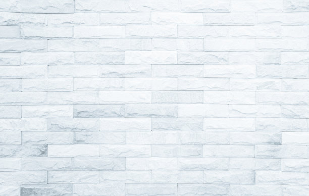 现代白色砖墙背景照片的细节。白色砖墙纹理背景为石瓦块，涂以灰色浅色壁纸现代内外和背景设计。图片下载