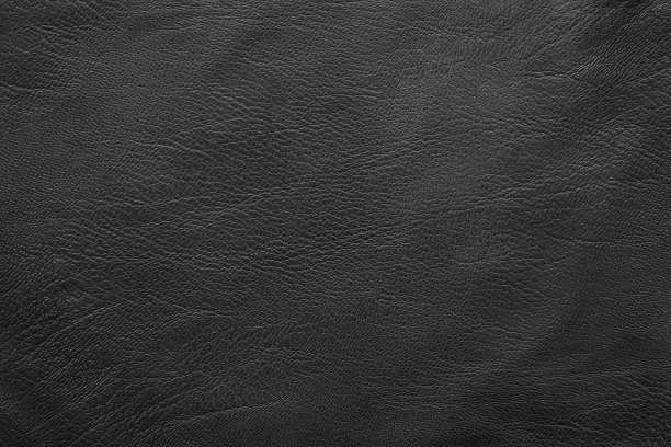 黑色皮革纹理背景与无缝图案。图片下载