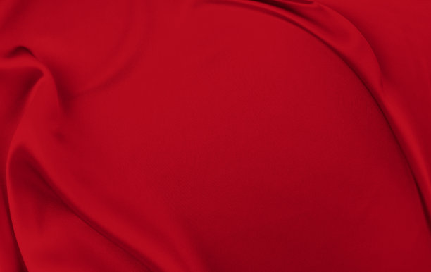 黑红色缎面深色面料纹理奢华闪亮，是抽象的丝绸布料背景与图案柔和的波浪模糊美丽。图片下载