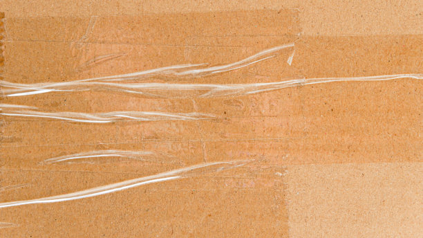 送货箱特写与购物图标和胶带，盒纸纹理背景与胶带图片下载