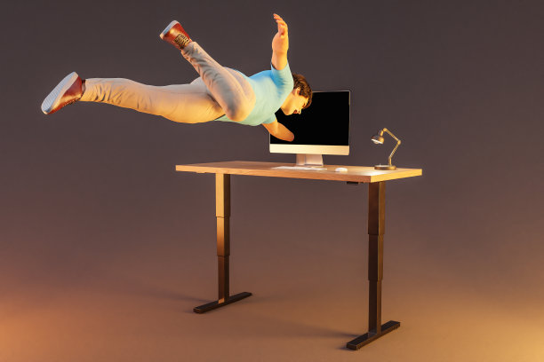 漂浮在空中的商人被吸进了电脑显示屏;超现实压力沉浸与虚拟现实概念;无限背景下孤立的办公桌;三维演示图片下载