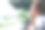 一个美丽的年轻亚洲女子在户外咖啡馆拿着热咖啡喝的特写照片图片下载