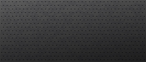 深色背景碳钢金属穿孔图片下载