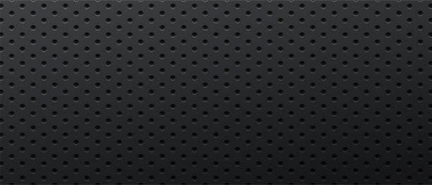 深色背景碳钢金属穿孔图片下载