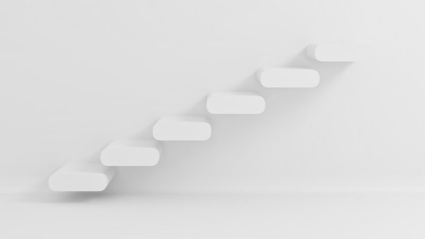 台阶在空白的墙上。上楼的楼梯图片下载