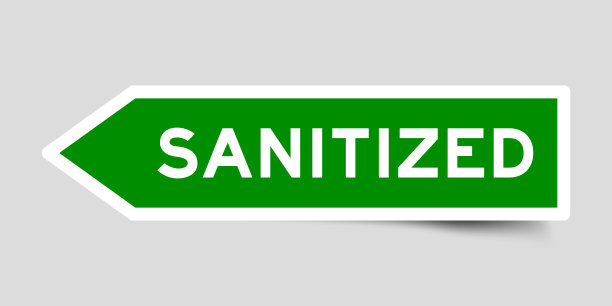 绿色箭头形状不干胶标签，在灰色背景上消毒图片下载